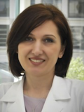 Elena Lucas, M.D.